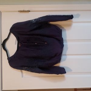 Shyanne navy blue top with lace detail. Size women's XS.